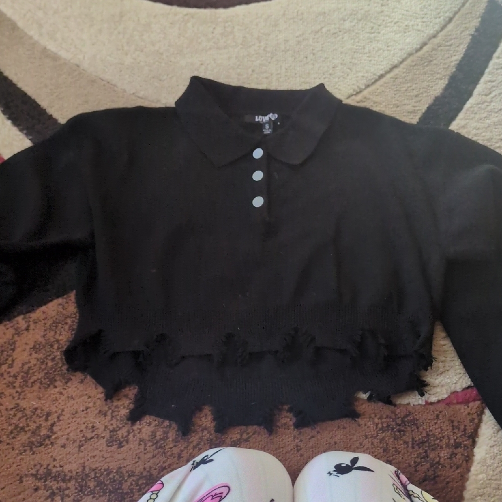 Stylish Black Sweater with Distressed Hem